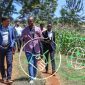 Dr. Rajiv Shah, President of The Rockefeller Foundation, and Denis Karema, Co-Founder and CEO of SokoFresh, visiting a farm outside Nairobi, Kenya, benefiting from solar-powered refrigeration thanks to investments by the Global Energy Alliance for People and Planet in collaboration with CLASP.